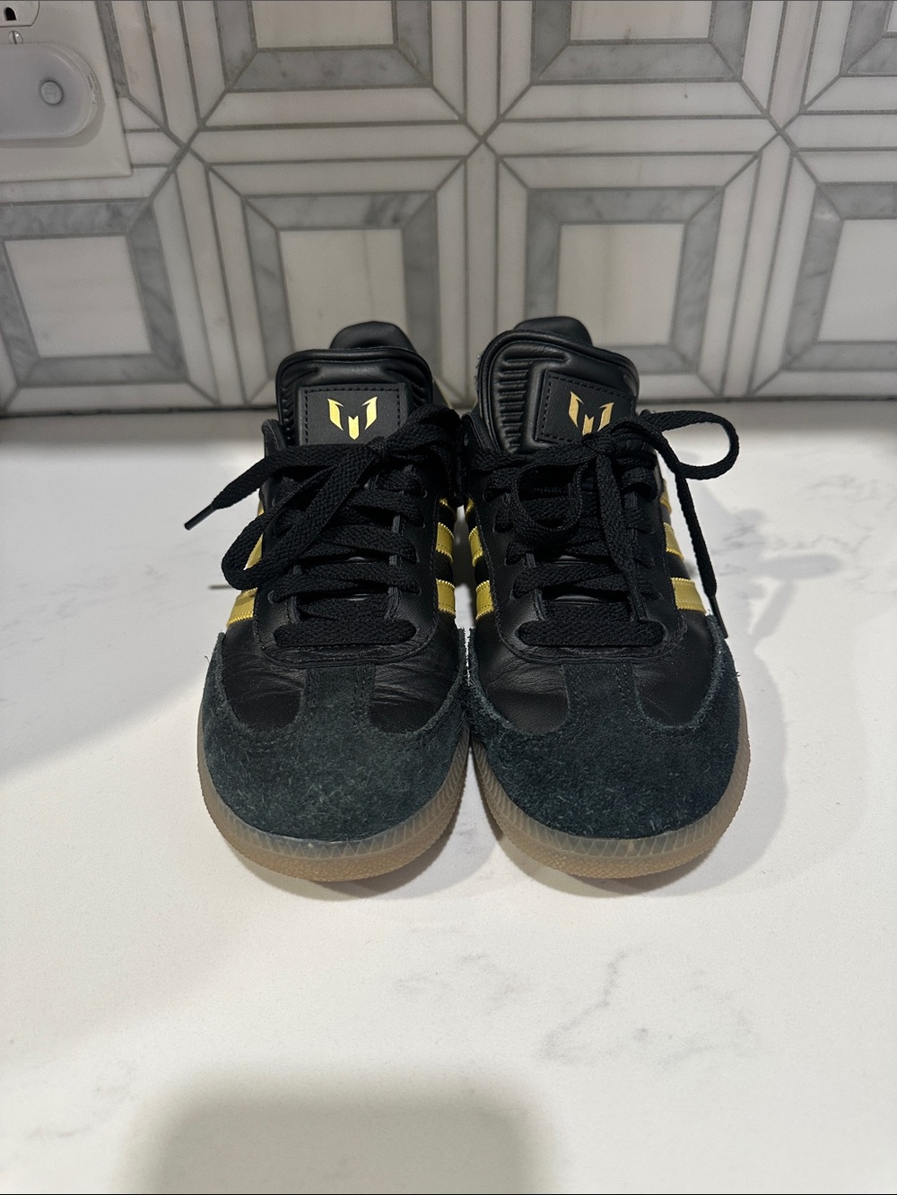 Adodas Black & Gold Messi Low-Top Sneakers